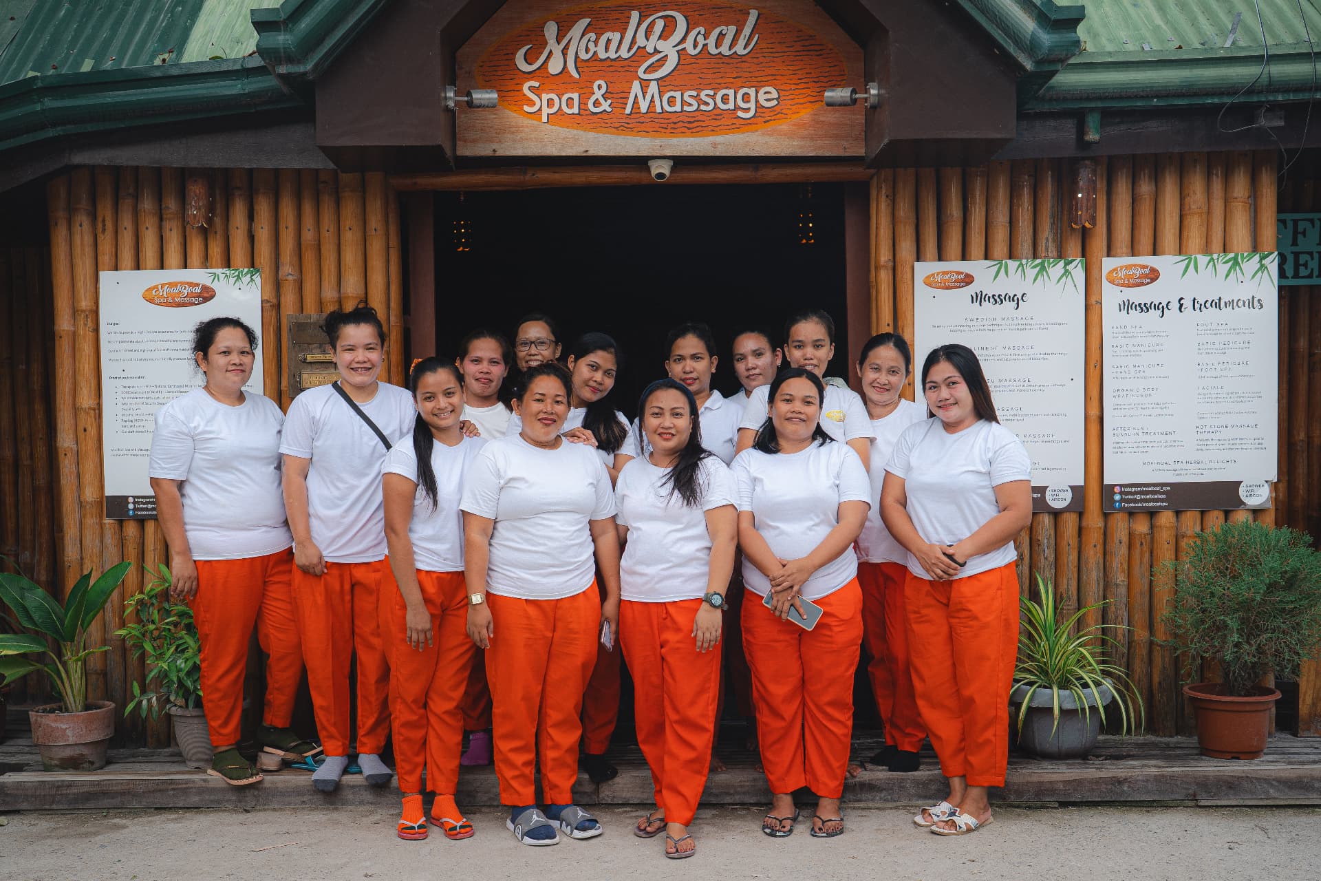 The Moalboal Spa & Massage team outside the bamboo spa